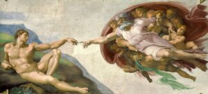 God reaches for Adam in Michelangelo's famous Creazioni di Adamo painting from the ceiling of the Sistine Chapel