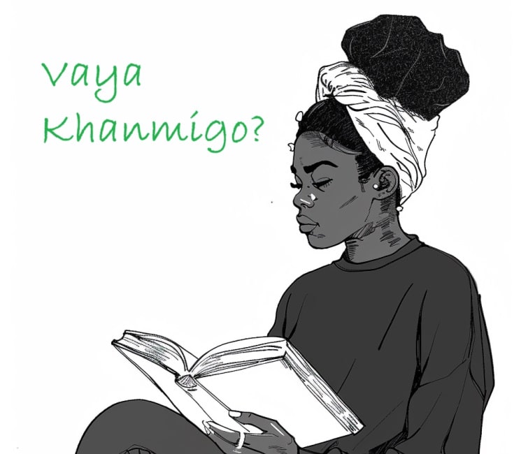 A young woman studying a book.