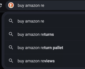 screenshot showing auto complete suggestion for "buy Amazon reviews" using DuckDuckGo search.